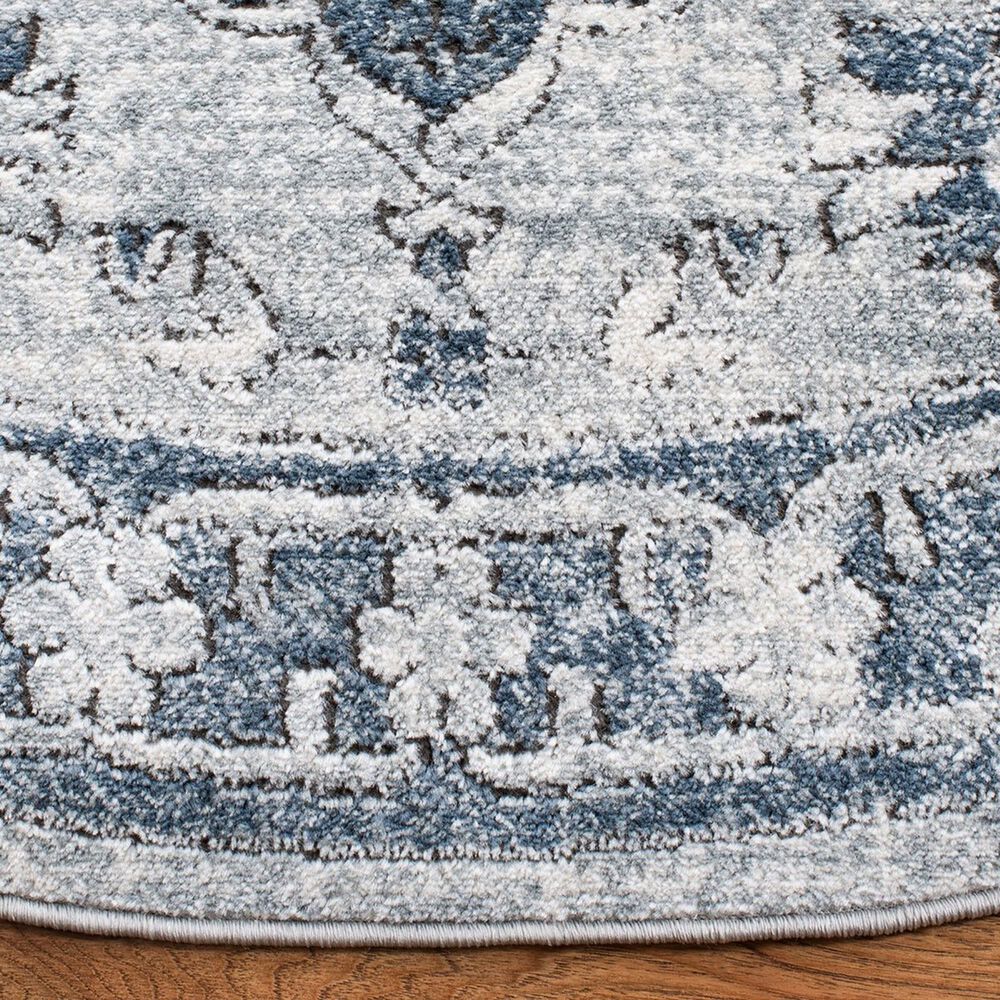 103602-safavieh-oregon-6-7-round-navy-and-ivory-area-rug-1.jpg