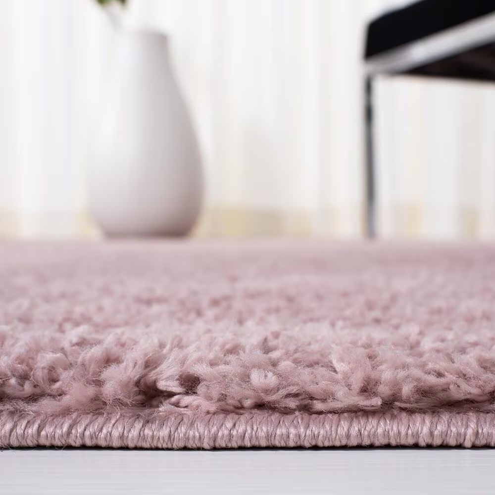 104611-safavieh-august-shag-aug533u-5-3-x-7-7-pink-area-rug-1.jpg