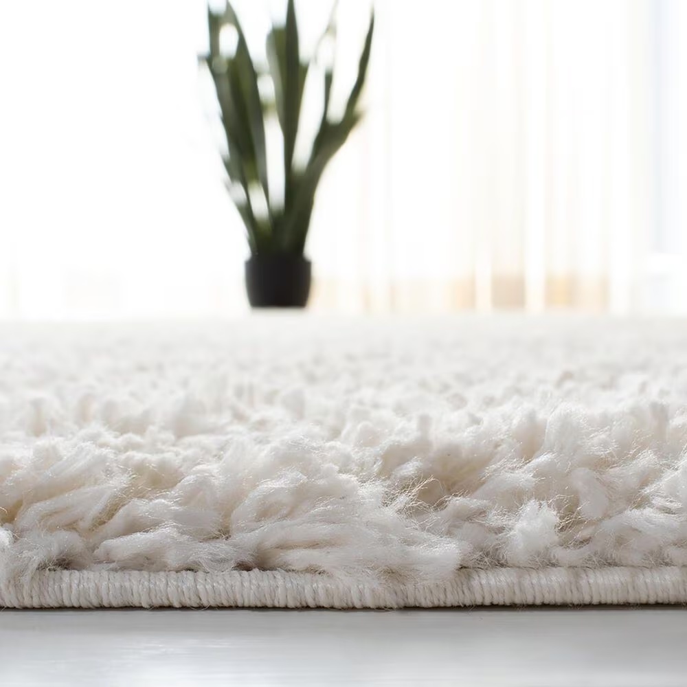 105542-safavieh-august-shag-aug200c-8-x-10-ivory-area-rug-1.jpg