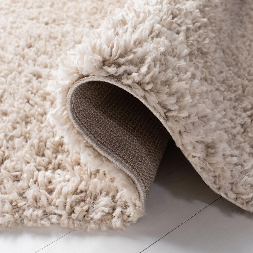 105612-safavieh-august-shag-aug200d-3-x-5-beige-area-rug-1.jpg