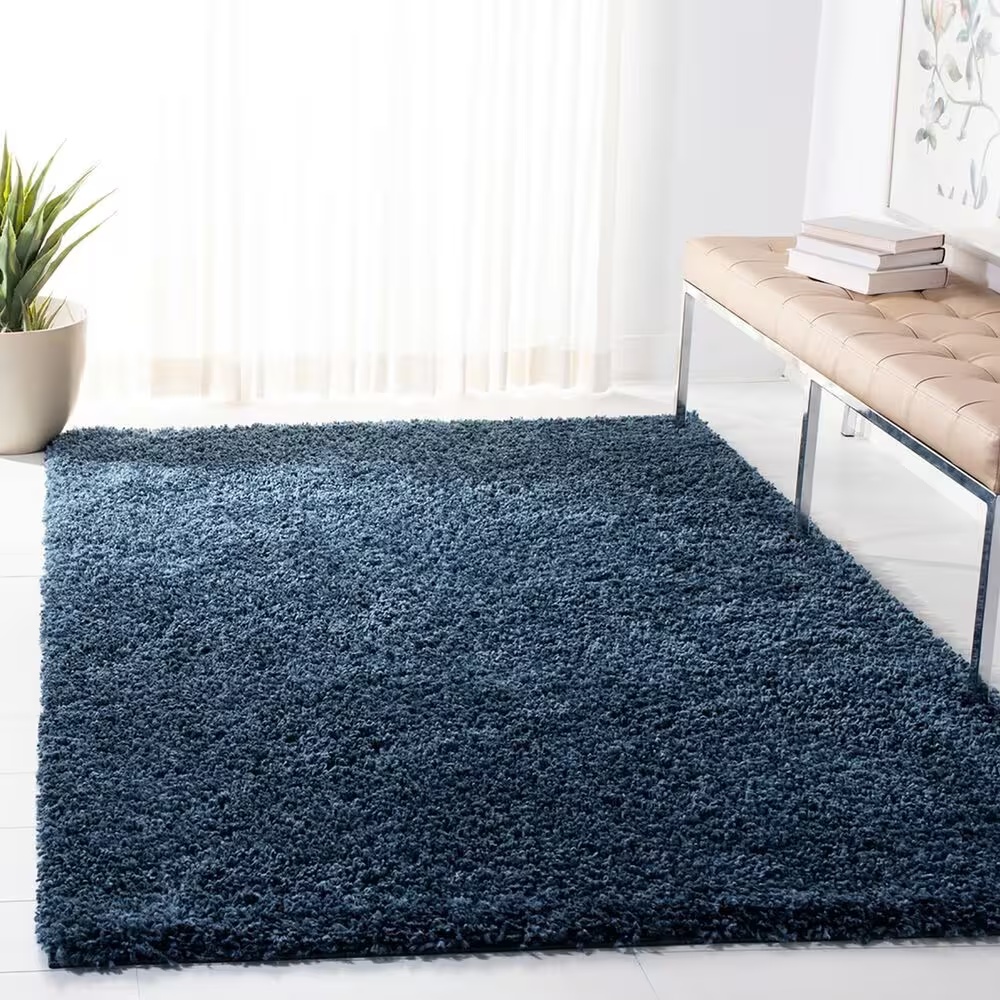 105992-safavieh-august-shag-aug200m-5-3-x-7-6-navy-area-rug-1.jpg