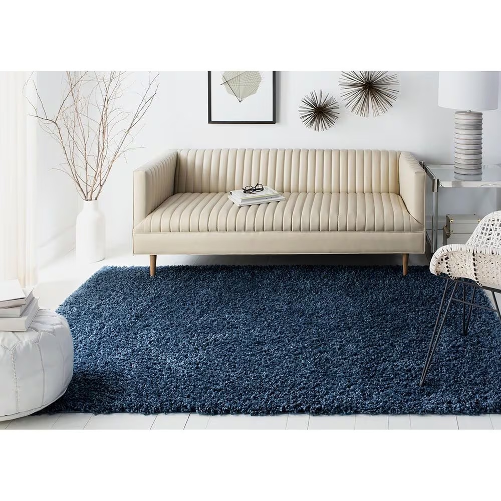105992-safavieh-august-shag-aug200m-5-3-x-7-6-navy-area-rug-1.jpg