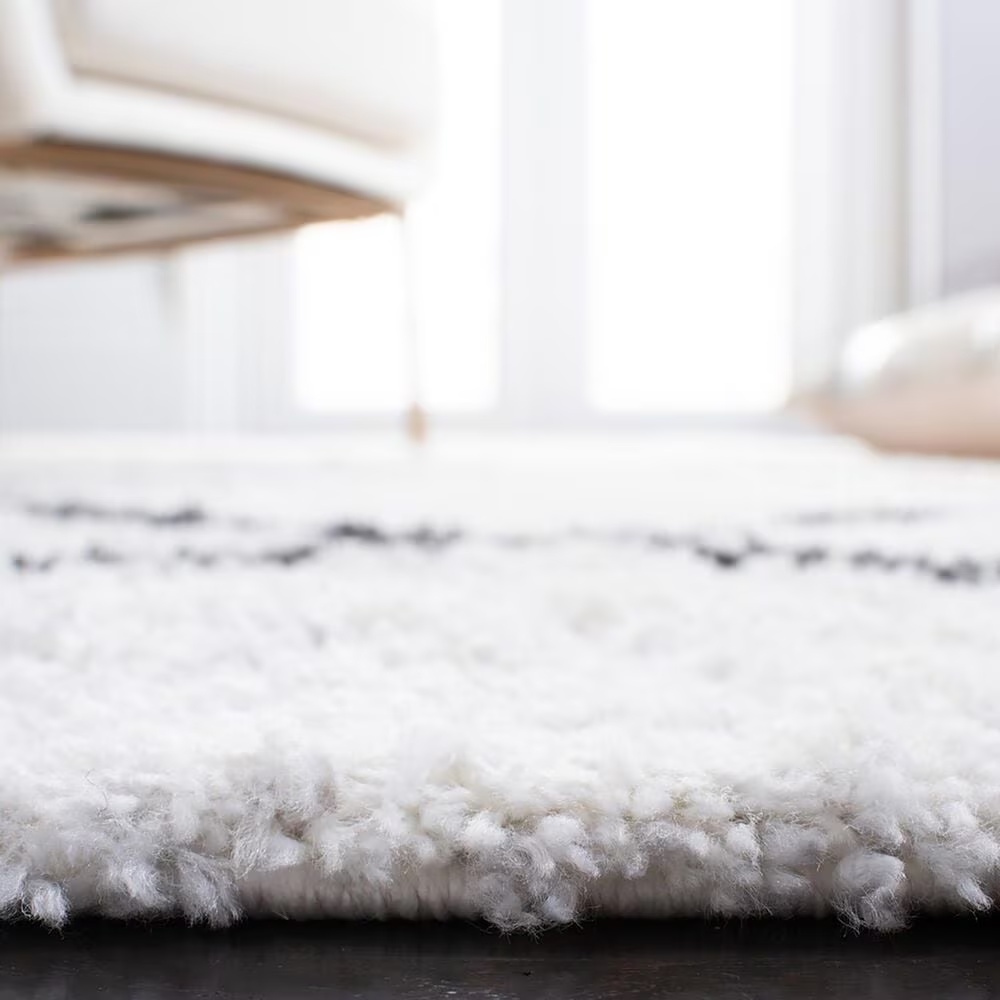 106225-safavieh-august-shag-8-x-10-ivory-and-black-area-rug-1.jpg