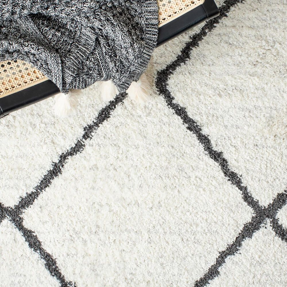106286-safavieh-august-shag-aug572a-9-x-12-ivory-and-black-area-rug-1.jpg