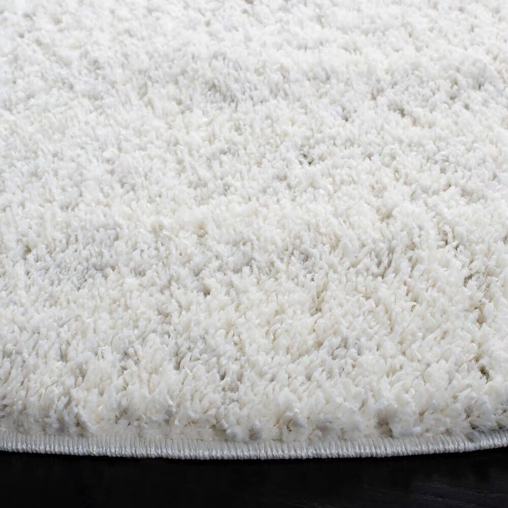 106334-safavieh-august-shag-6-7-round-ivory-and-dark-grey-area-rug-1.jpg