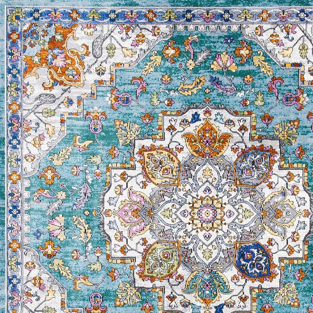 110985-safavieh-aria-6-6-round-turquoise-and-ivory-area-rug-1.jpg