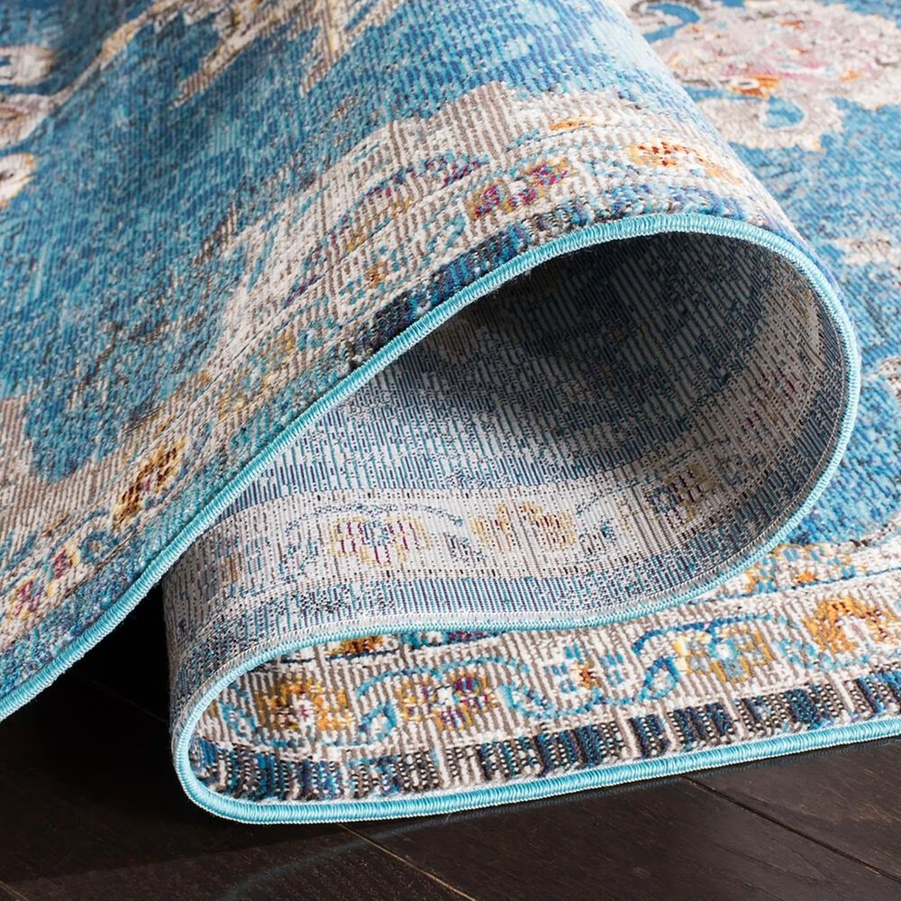 111033-safavieh-aria-ara103n-9-x-12-blue-and-ivory-area-rug-1.jpg