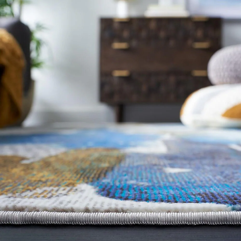 111051-safavieh-aria-abstract-5-1-x-7-6-ivory-and-navy-area-rug-1.jpg