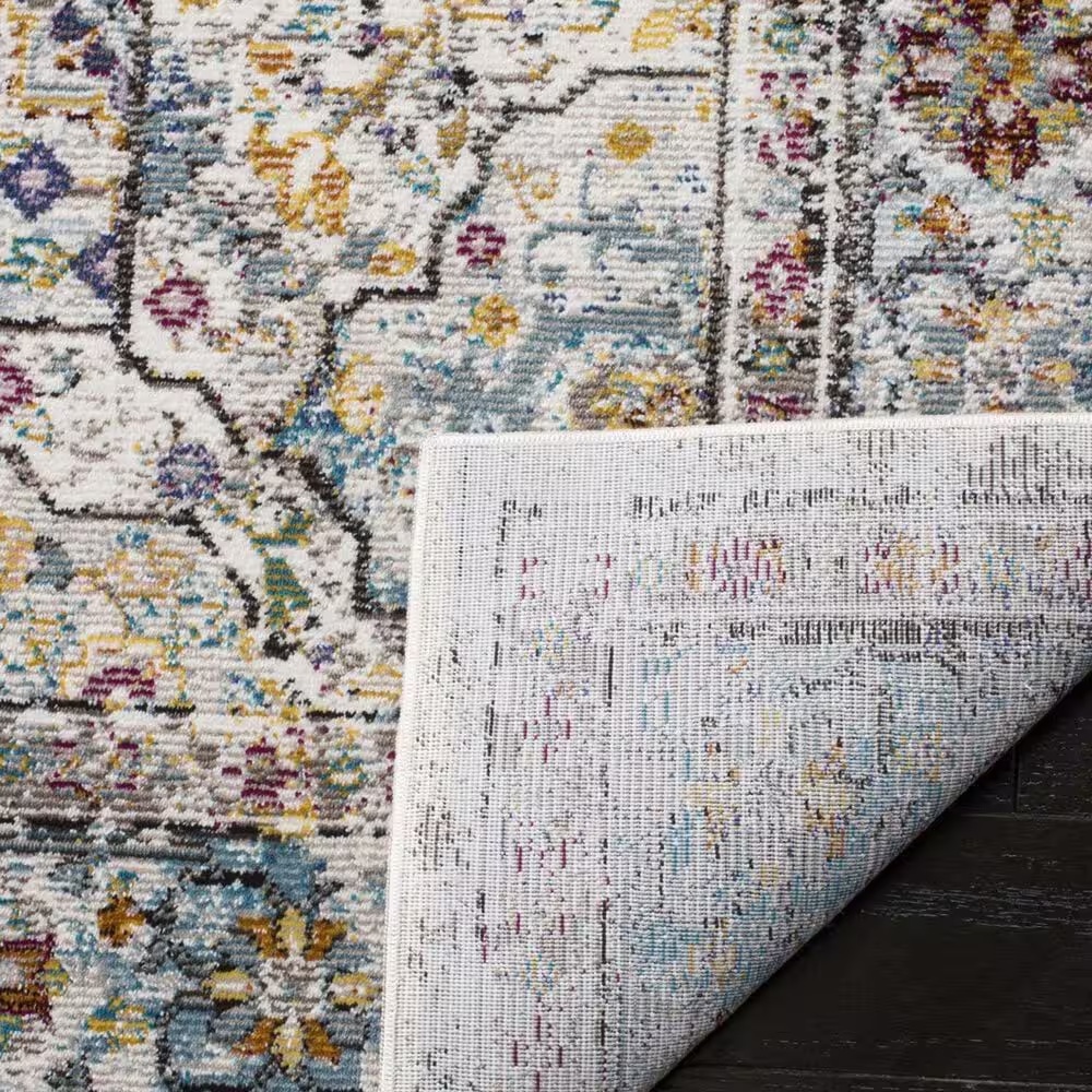 111803-safavieh-aria-ara199c-5-1-x-7-6-cream-and-blue-area-rug-1.jpg