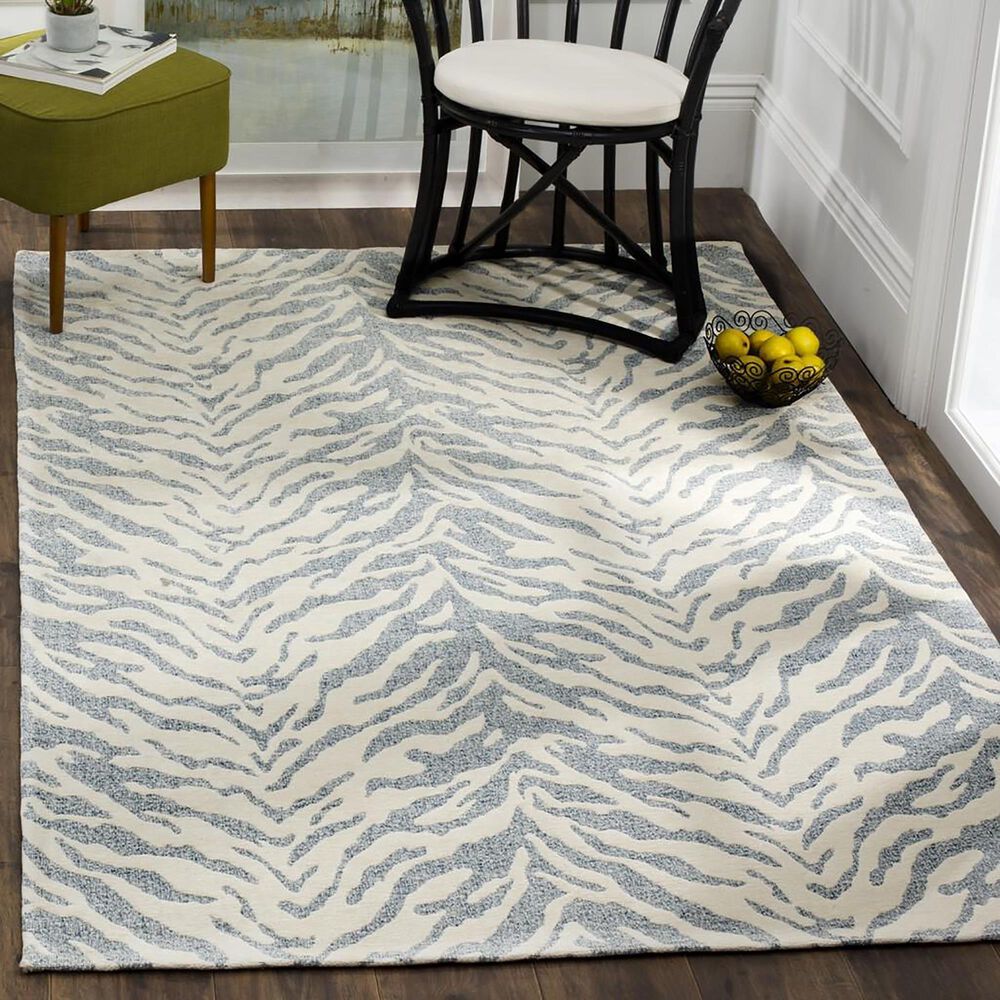 113354-safavieh-marbella-mrb632c-8-x-10-blue-and-ivory-area-rug-1.jpg