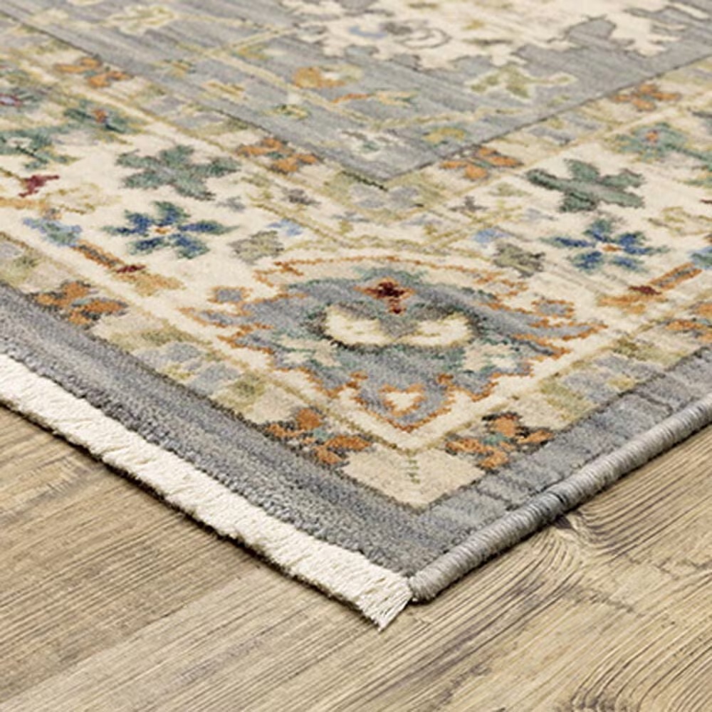 115009-oriental-weavers-lucca-oriental-border-6-7-x-9-6-blue-area-rug-1.jpg