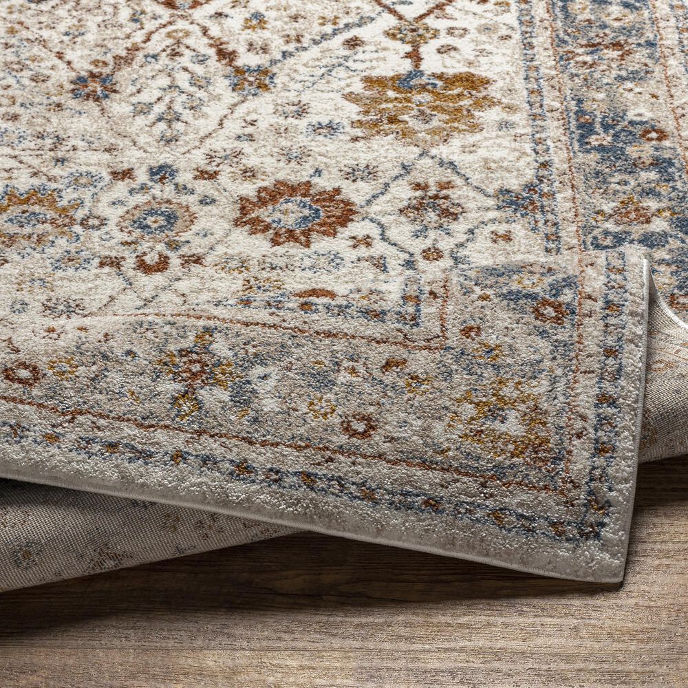 115606-surya-tuscany-6-7-x-9-6-beige-blue-and-rust-area-rug-1.jpg