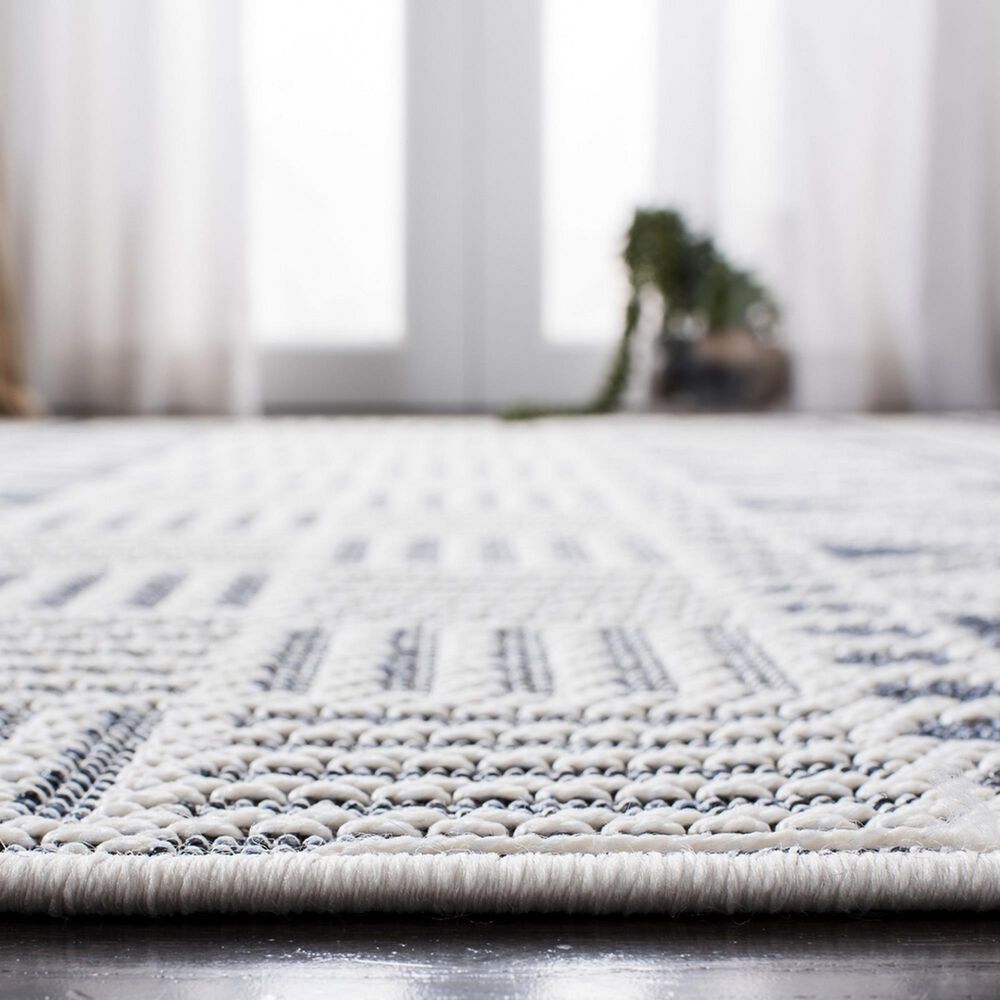 118205-safavieh-bermuda-5-3-x-7-6-cream-and-navy-indoor-outdoor-area-performance-rug-1.jpg