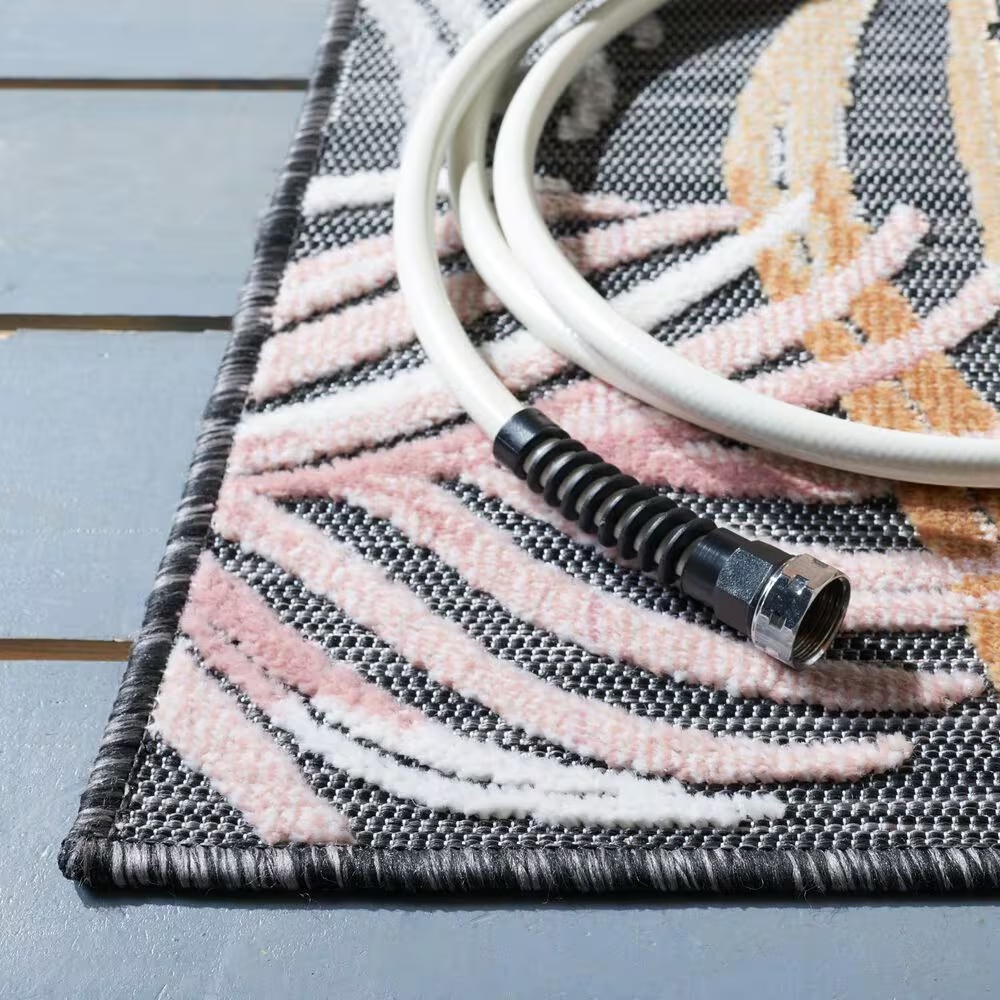 118776-safavieh-cabana-cbn445h-6-6-x-9-6-black-and-rust-indoor-outdoor-area-performance-rug-1.jpg