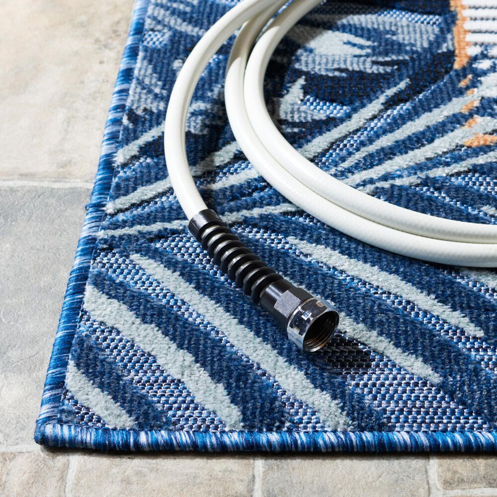 119104-safavieh-cabana-cbn453n-5-1-x-7-6-ivory-and-navy-indoor-outdoor-area-performance-rug-1.jpg