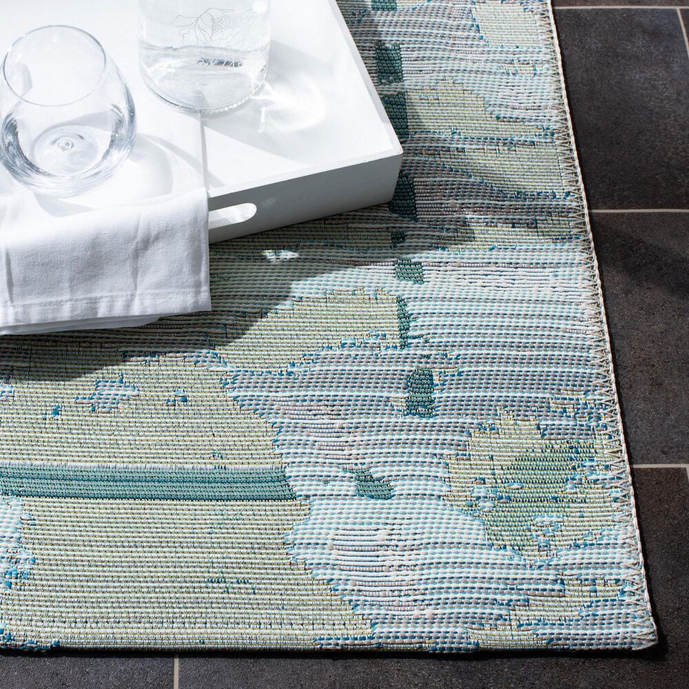 120336-safavieh-barbados6-6-x-9-4-teal-and-white-indoor-outdoor-area-rug-1.jpg
