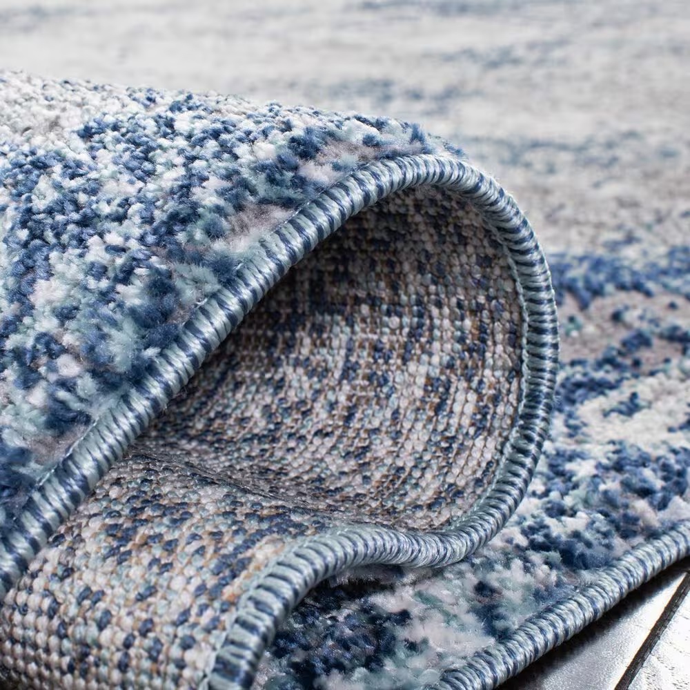 129313-safavieh-aston7-10-round-navy-and-gray-area-rug-1.jpg