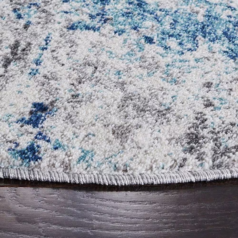 129396-safavieh-aston-7-10-round-light-blue-and-grey-area-rug-1.jpg