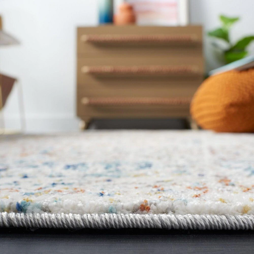 129954-safavieh-aston-asn728-8-x-10-ivory-and-navy-area-rug-1.jpg