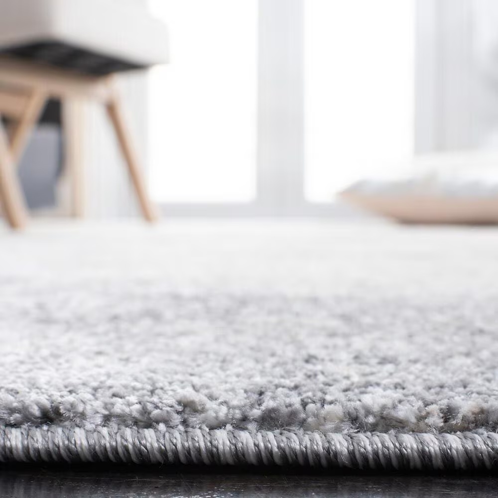 130005-safavieh-aston-asn704-9-x-12-ivory-and-grey-area-rug-1.jpg