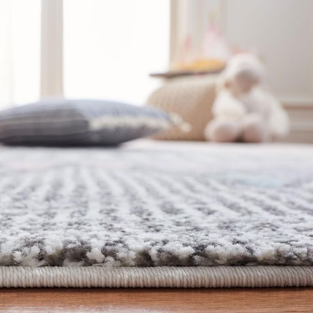 130780-safavieh-carousel-outer-space-6-7-x-9-grey-and-pink-kidsarea-rug-1.jpg