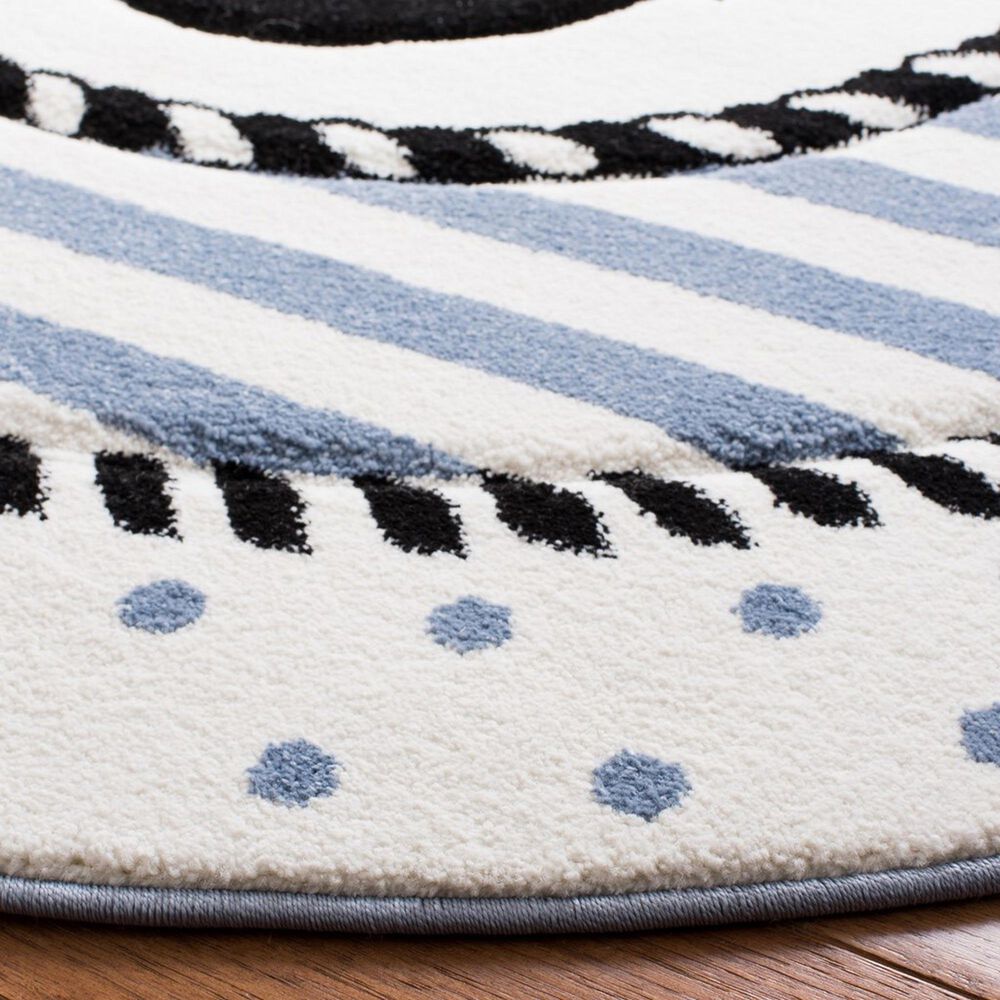 130902-safavieh-carousel-8-round-ivory-and-navy-kidsarea-rug-1.jpg