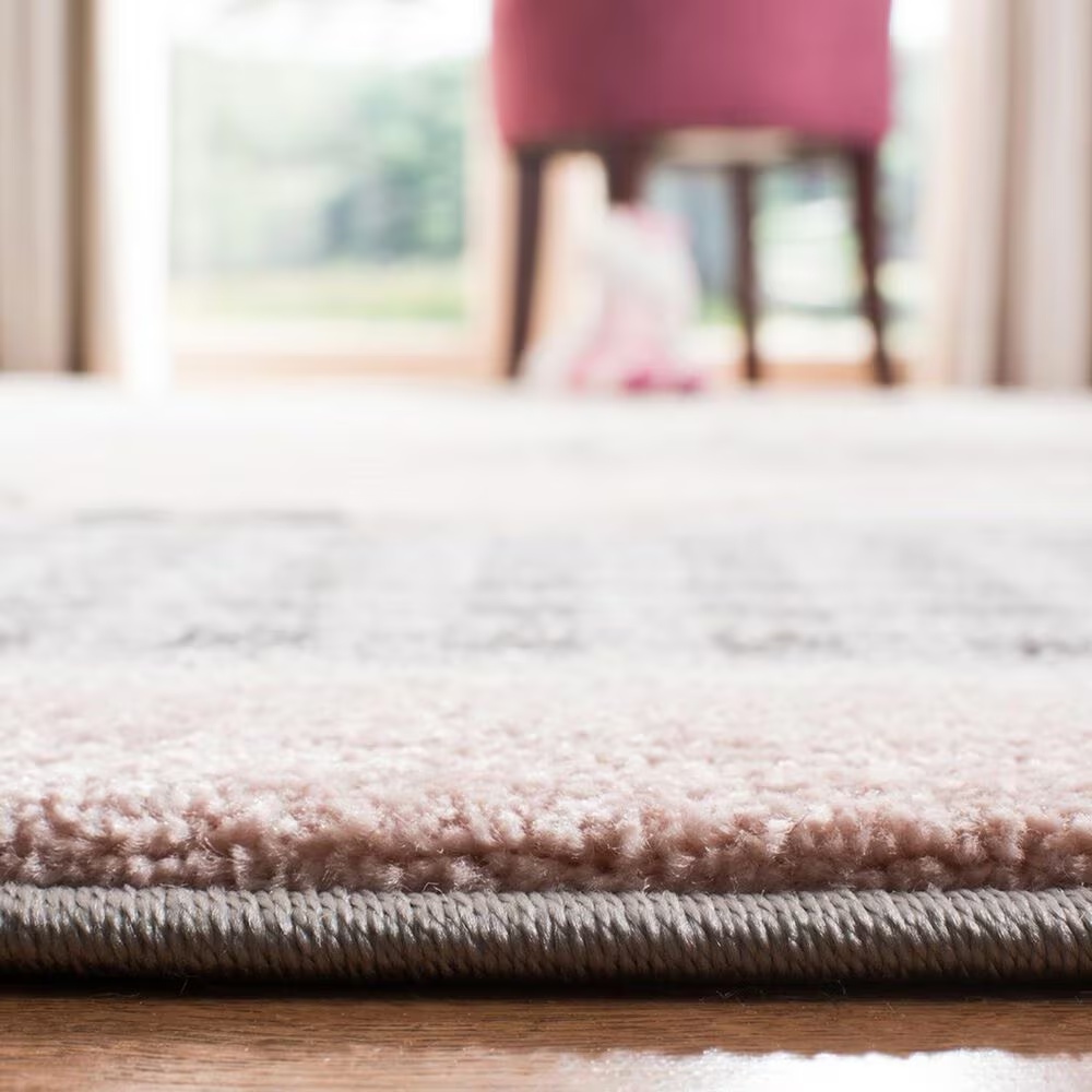 131011-safavieh-carousel-crk127-3-3-x-5-3-pink-and-ivory-kidsarea-rug-1.jpg