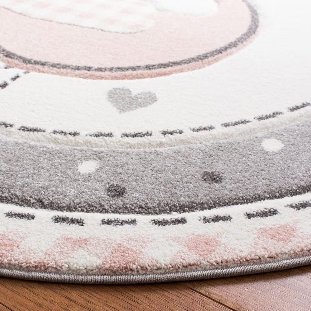 131590-safavieh-carousel-crk154-5-3-round-pink-and-ivory-kidsarea-rug-1.jpg