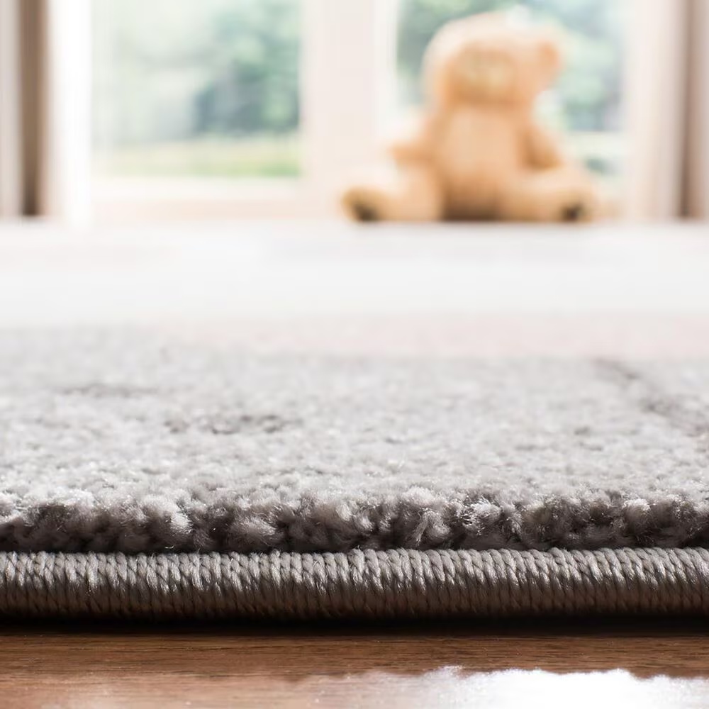 132334-safavieh-carousel-6-7-round-pink-and-grey-kidsarea-rug-1.jpg