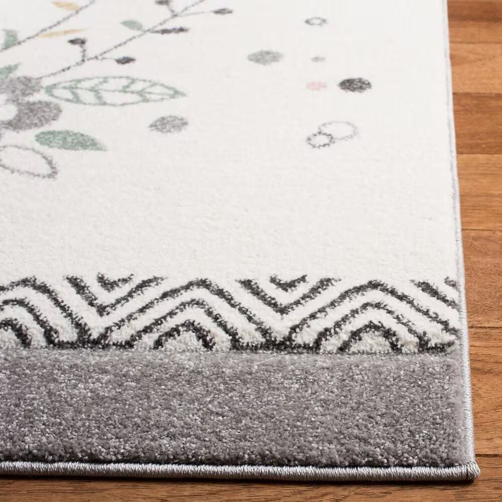 132356-safavieh-carousel-crk187-5-3-x-7-6-ivory-and-pink-kidsarea-rug-1.jpg