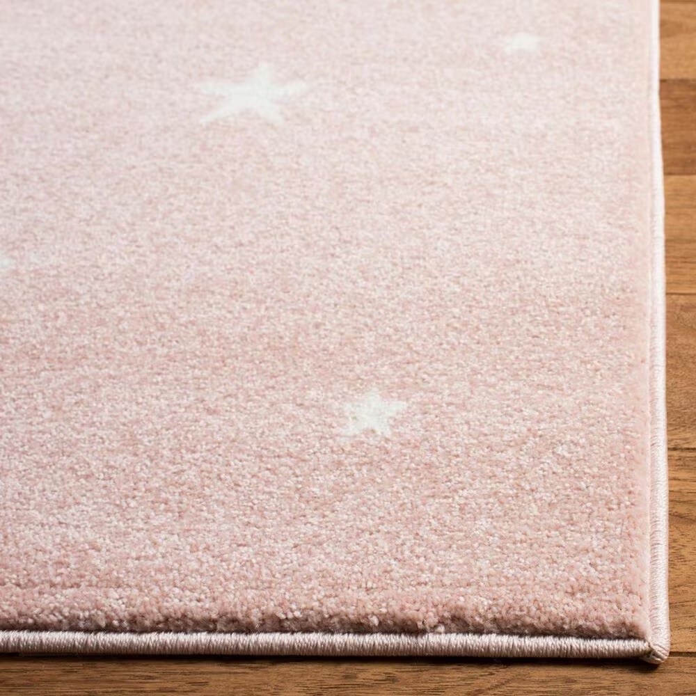 132392-safavieh-carousel-crk191-5-3-x-7-6-pink-and-ivory-kidsarea-rug-1.jpg