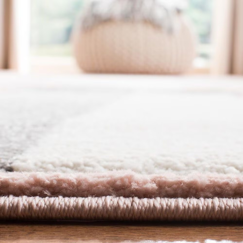 132392-safavieh-carousel-crk191-5-3-x-7-6-pink-and-ivory-kidsarea-rug-1.jpg