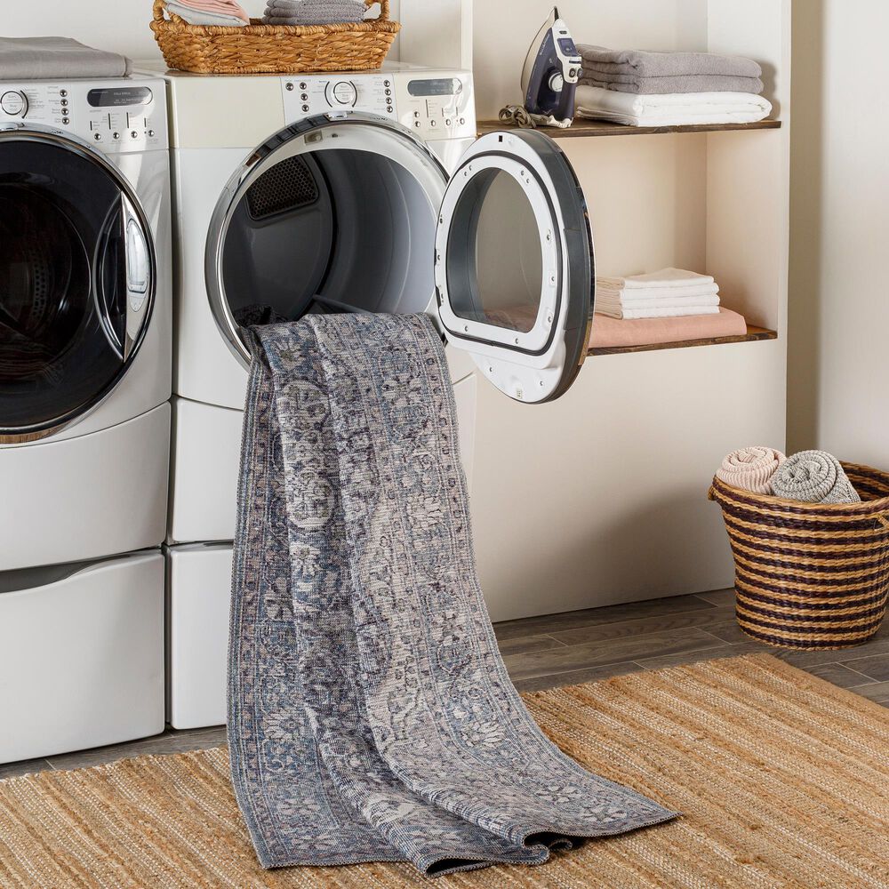 145110-surya-colin-5-3-x-7-3-light-blue-medium-green-gray-charcoal-tan-and-cream-area-rug-1.jpg
