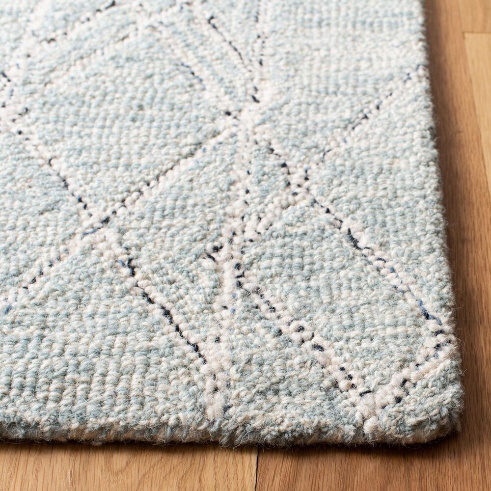 150311-safavieh-micro-loop-5-x-8-ivory-and-light-blue-area-rug-1.jpg