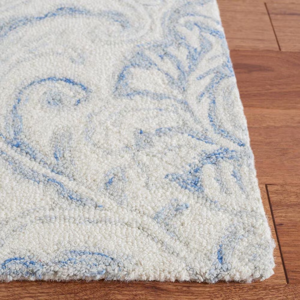 152042-safavieh-micro-loop-mlp532a-4-x-6-ivory-and-blue-area-rug-1.jpg