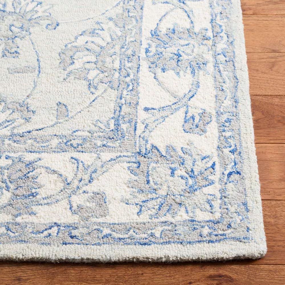 152182-safavieh-micro-loop-traditional-10-x-14-light-blue-and-ivory-area-rug-1.jpg