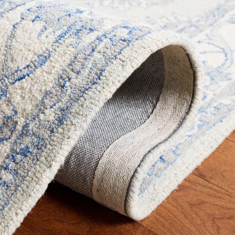 152182-safavieh-micro-loop-traditional-10-x-14-light-blue-and-ivory-area-rug-1.jpg