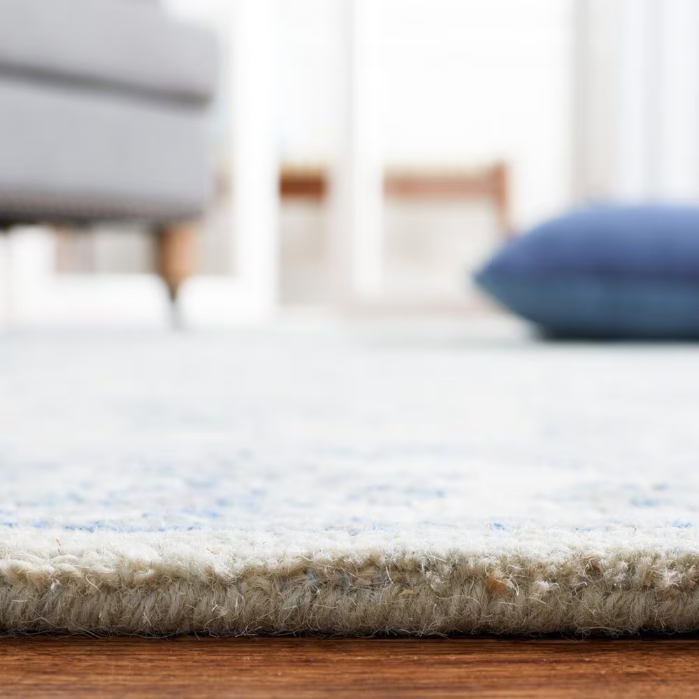 152182-safavieh-micro-loop-traditional-10-x-14-light-blue-and-ivory-area-rug-1.jpg