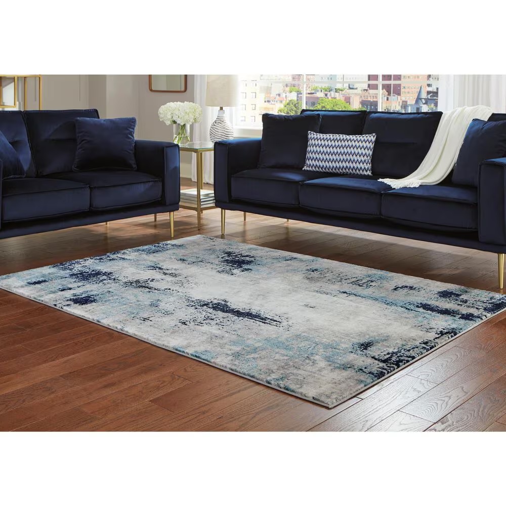 157622-ashley-leonelle-7-10-x-10-cream-blue-and-gray-area-rug-1.jpg