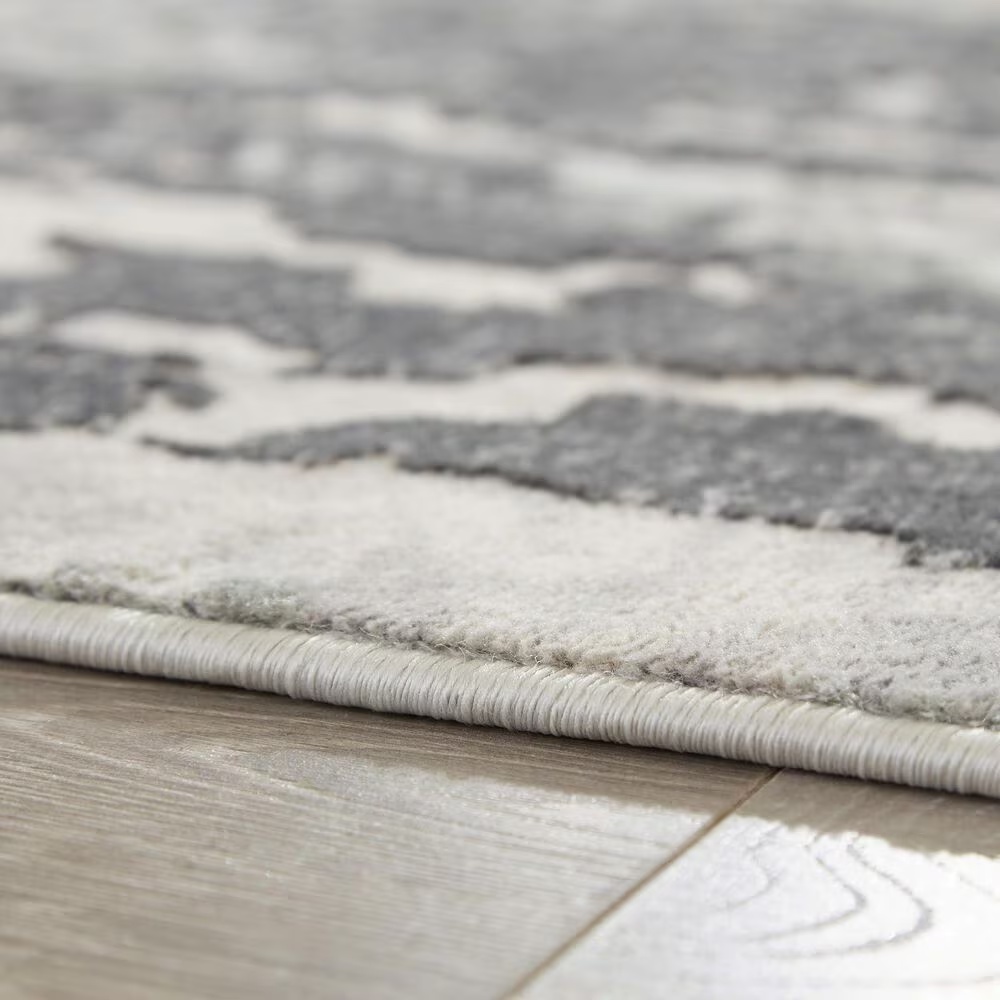 157625-ashley-mazatl-7-10-x-10-2-gray-and-cream-area-rug-1.jpg