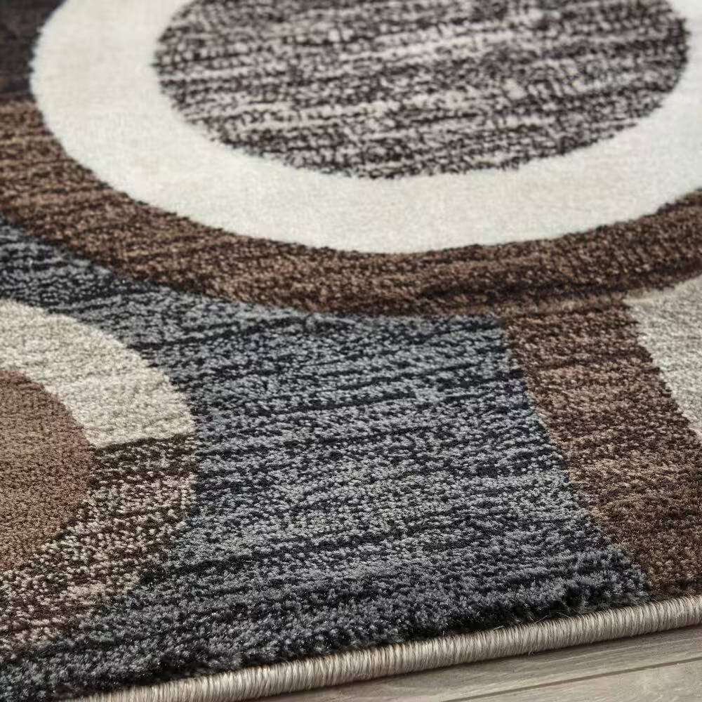 157634-ashley-guintte-8-x-9-6-black-brown-and-cream-area-rug-1.jpg