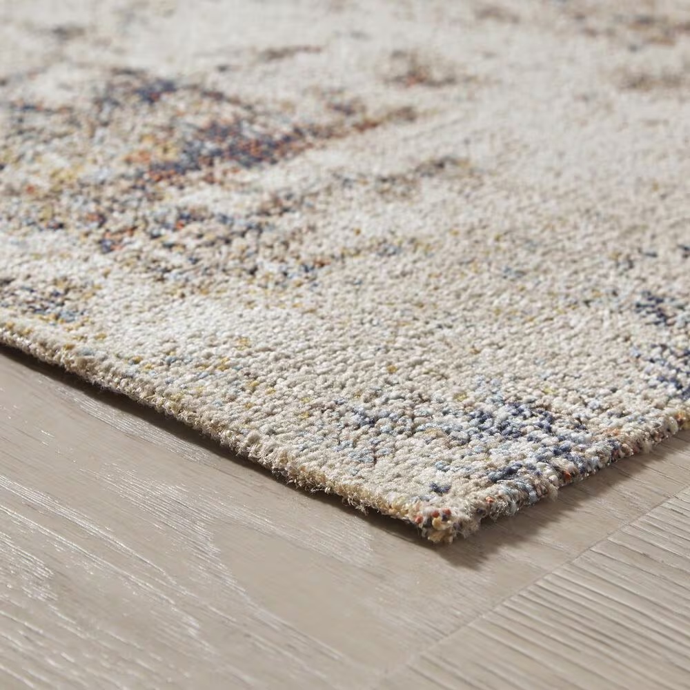 157680-ashley-jerelyn-7-10-x-10-gray-ivory-and-orange-indoor-outdoor-area-rug-1.jpg