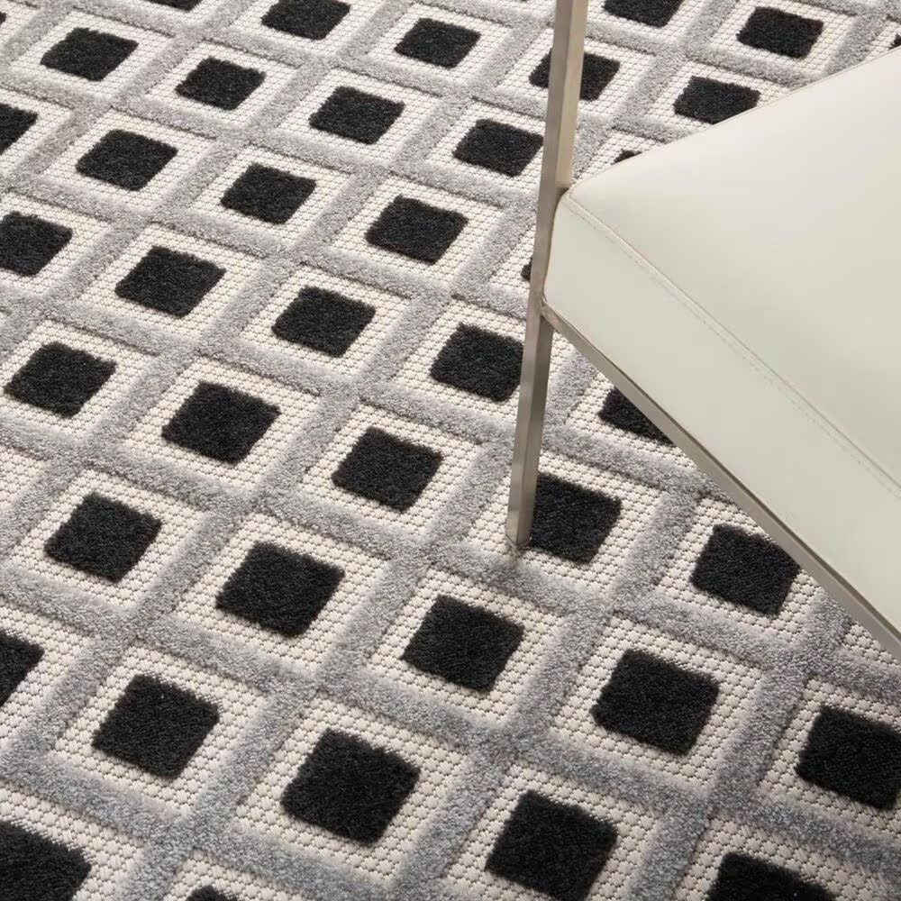 181438-nourison-aloha-geometric-5-3-x-7-5-black-and-white-indoor-outdoor-area-rug-1.jpg