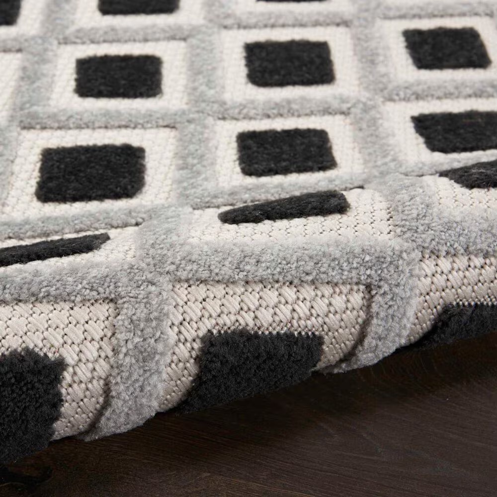 181438-nourison-aloha-geometric-5-3-x-7-5-black-and-white-indoor-outdoor-area-rug-1.jpg