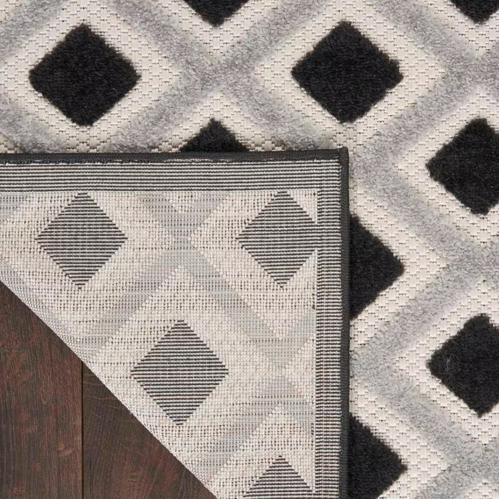 181438-nourison-aloha-geometric-5-3-x-7-5-black-and-white-indoor-outdoor-area-rug-1.jpg