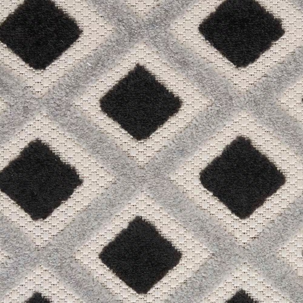 181438-nourison-aloha-geometric-5-3-x-7-5-black-and-white-indoor-outdoor-area-rug-1.jpg