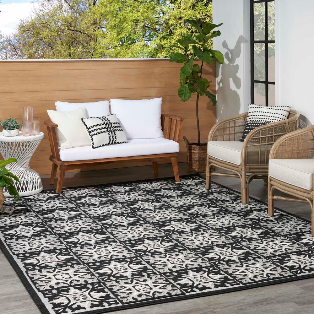 181446-nourison-aloha-5-3-x-7-5-black-white-indoor-outdoor-area-rug-1.jpg