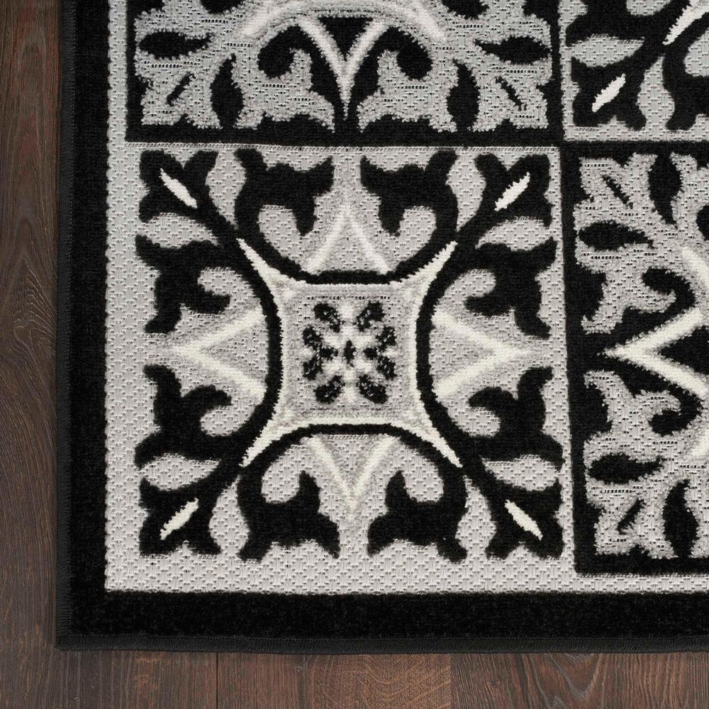 181446-nourison-aloha-5-3-x-7-5-black-white-indoor-outdoor-area-rug-1.jpg