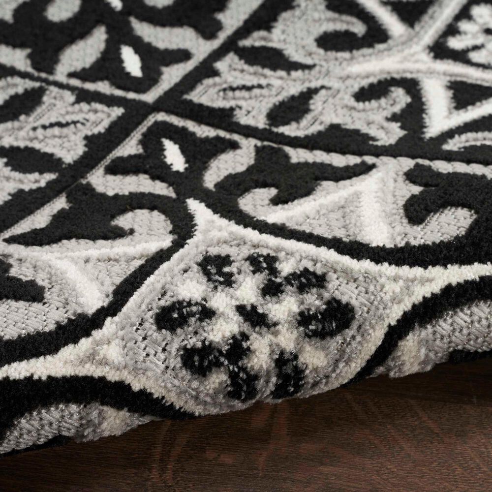 181446-nourison-aloha-5-3-x-7-5-black-white-indoor-outdoor-area-rug-1.jpg
