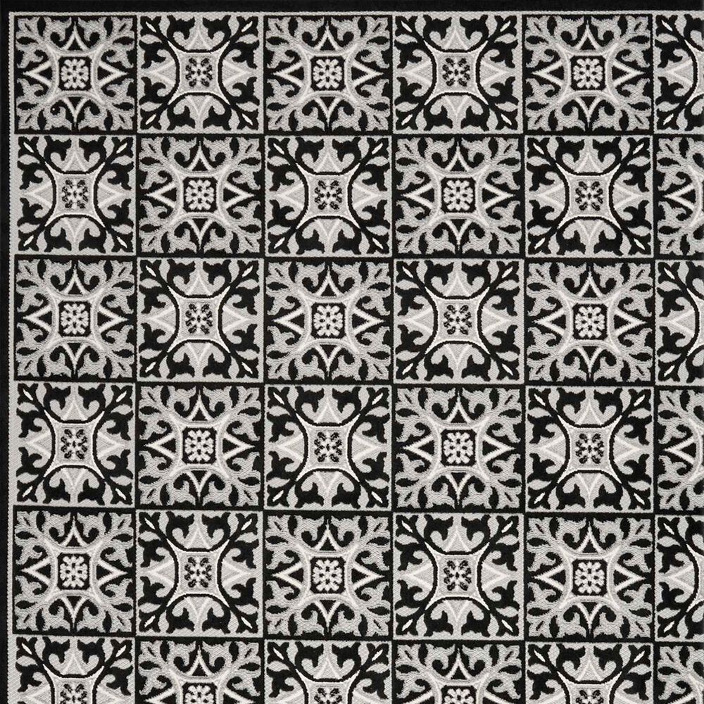 181446-nourison-aloha-5-3-x-7-5-black-white-indoor-outdoor-area-rug-1.jpg